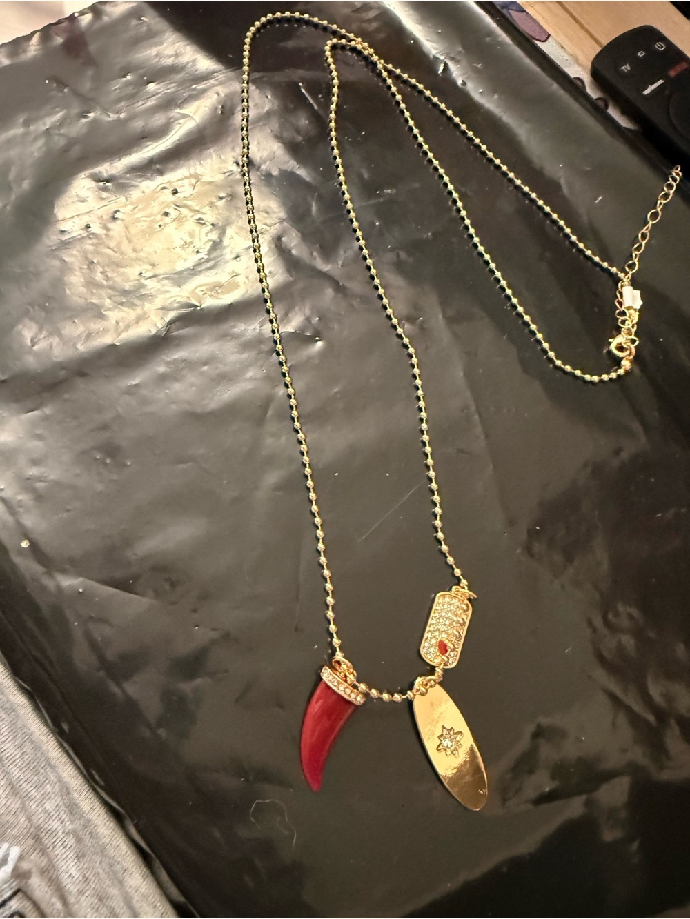 Torrid Gold Tone Red Horn Rhinestone Charm Pendant Necklace 32”